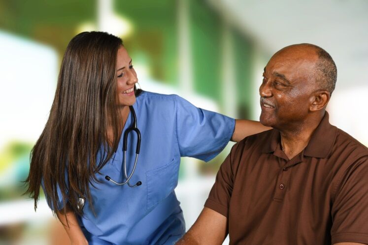 health-care-worker-helping-a-patient